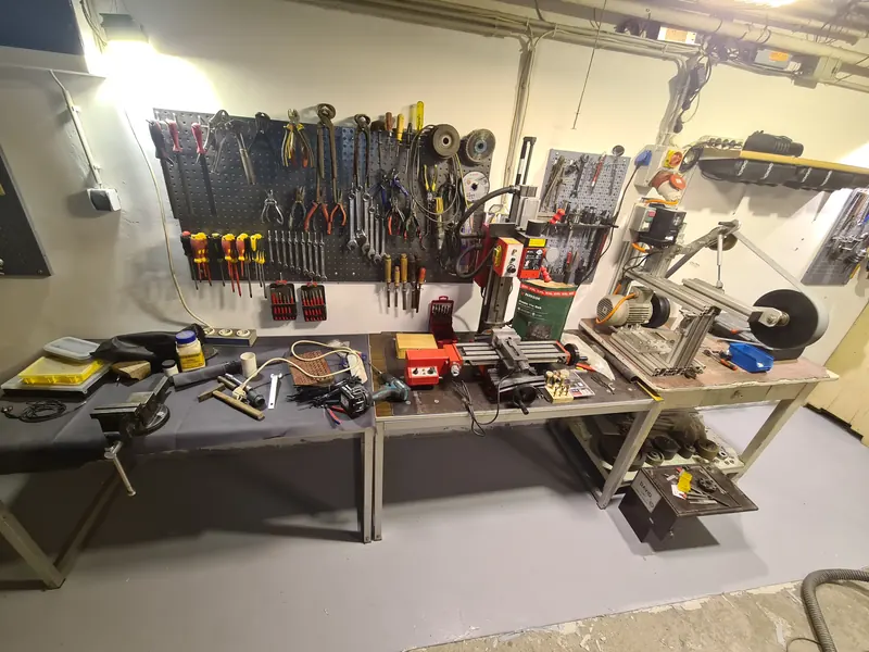 My workshop bench, hand tools, milling machine and belt sander